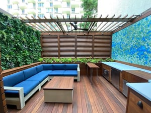 Exterior Faux Green Wall with adjacent blue and green wall feature